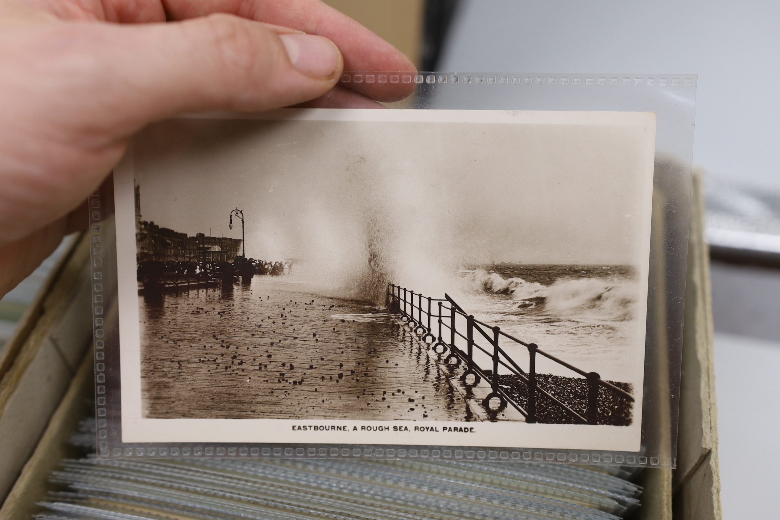 A large quantity of early to mid 20th century postcards of Eastbourne and the surrounding area, all in individual protective sleeves